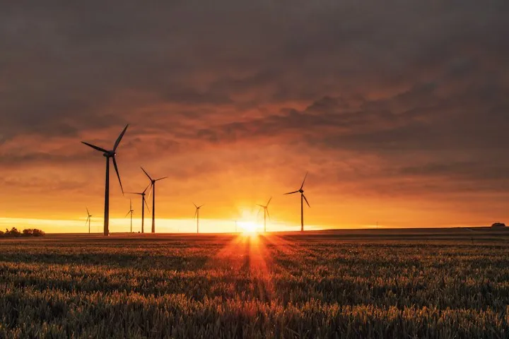 Wind turbines at sunset